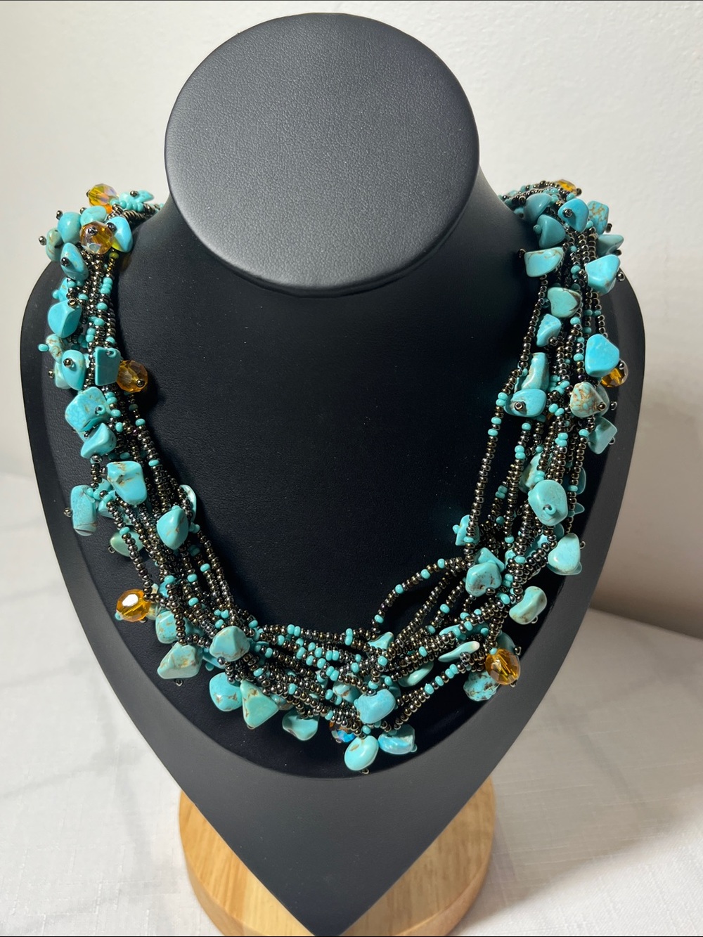 Turquoise Multi-Strand Beaded Necklace 
Amber accents